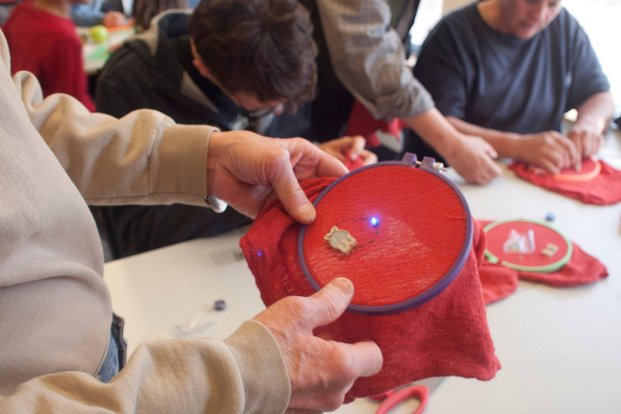 The electronic textiles workshop teaches the basics of sewing LEDs into fabric.