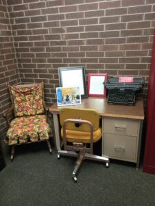 desk, chairs, typewriter