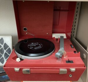 Record player with 8RPM Talking Book Disc